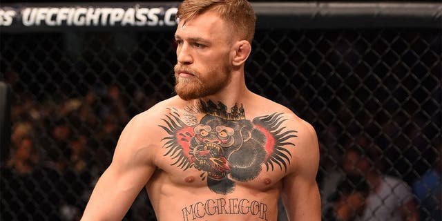 LAS VEGAS, NV - DECEMBER 12: Conor McGregor of Ireland enters the Octagon before his UFC welterweight championship bout against Jose Aldo during the UFC 194 event inside MGM Grand Garden Arena on December 12, 2015 in Las Vegas, Nevada. (Photo by Josh Hedges/Zuffa LLC/Zuffa LLC via Getty Images)