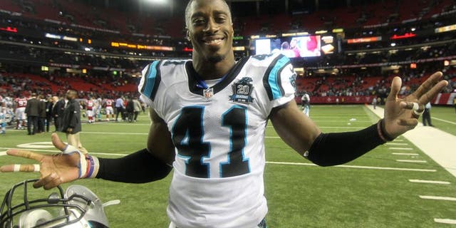 Dec 28, 2014; Atlanta, GA, USA; Carolina Panthers strong safety Roman Harper (41) celebrates a victory against the Atlanta Falcons at the Georgia Dome. The Panthers defeated the Falcons 34-3. Mandatory Credit: Brett Davis-USA TODAY Sports