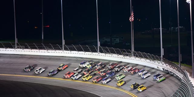 Drivers race during the NASCAR Sprint Cup Series Coke Zero 400 Powered by Coca-Cola at Daytona International Speedway on July 6, 2015 in Daytona Beach, Florida.
