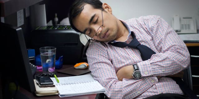 Man sleep on office