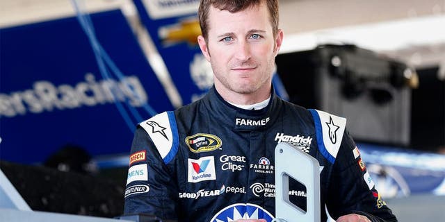 AVONDALE, AZ - NOVEMBER 13: Kasey Kahne, driver of the #5 Farmers Insurance Chevrolet, stands in the garage area during practice for the NASCAR Sprint Cup Series Quicken Loans Race for Heroes 500 at Phoenix International Raceway on November 13, 2015 in Avondale, Arizona. (Photo by Christian Petersen/Getty Images)