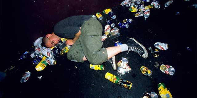 Punk asleep amoungst litter and beer cans on the floor at a gig. London Astoria 1998. (Photo by: PYMCA/UIG via Getty Images)