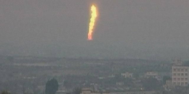 Feb. 5: In this image taken from Associated Press Television News video, a fire is seen after an explosion went off at a gas terminal in Egypt's northern Sinai Peninsula, setting off a massive fire along a gas pipeline that could be seen dozens of miles away, officials and witnesses said.