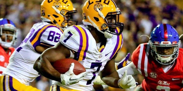 Oct 22, 2016; Baton Rouge, LA, USA; LSU Tigers running back Leonard Fournette (7) runs for a touchdown against the Mississippi Rebels during the second quarter of a game at Tiger Stadium. Mandatory Credit: Derick E. Hingle-USA TODAY Sports