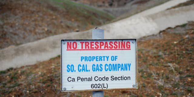 Jan. 7, 2016: A sign declares the boundary line of the Southern California Gas Co. gas fields where a gas well has been leaking methane daily near the community Porter Ranch, Calif.