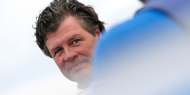 TALLADEGA, AL - OCTOBER 24: Michael Waltrip, driver of the #98 Maxwell House Toyota, stands on the grid during qualifying for the NASCAR Sprint Cup Series CampingWorld.com 500 at Talladega Superspeedway on October 24, 2015 in Talladega, Alabama. (Photo by Brian Lawdermilk/Getty Images)
