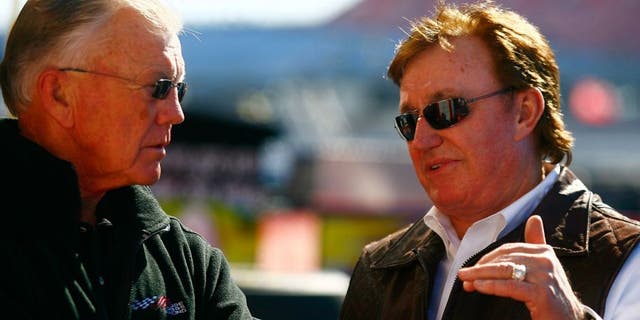 TALLADEGA, AL - OCTOBER 29: Team owners Joe Gibbs (L) and Richard Childress talk in the garage area during practice for the NASCAR Sprint Cup Series AMP Energy Juice 500 at Talladega Superspeedway on October 29, 2010 in Talladega, Alabama. (Photo by Jason Smith/Getty Images for NASCAR)