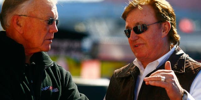 TALLADEGA, AL - OCTOBER 29: Team owners Joe Gibbs (L) and Richard Childress talk in the garage area during practice for the NASCAR Sprint Cup Series AMP Energy Juice 500 at Talladega Superspeedway on October 29, 2010 in Talladega, Alabama. (Photo by Jason Smith/Getty Images for NASCAR)