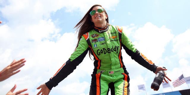 BROOKLYN, MI - AUGUST 16: Danica Patrick, driver of the #10 GoDaddy Chevrolet, is introduced during pre-race ceremonies before the NASCAR Sprint Cup Series Pure Michigan 400 at Michigan International Speedway on August 16, 2015 in Brooklyn, Michigan. (Photo by Nick Laham/NASCAR via Getty Images)