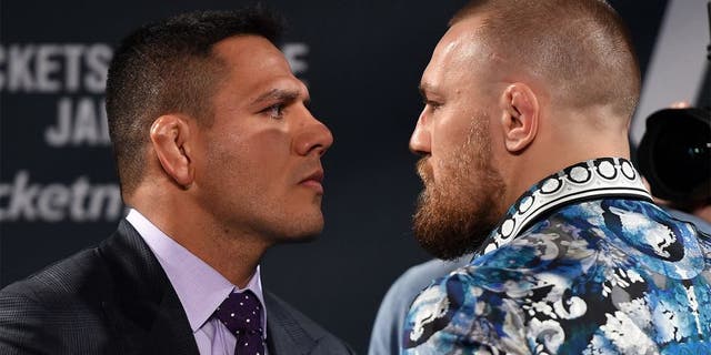 LAS VEGAS, NV - JANUARY 20: Rafael dos Anjos of Brazil (L) and Conor McGregor of Ireland (R) face off during the UFC 197 on-sale press conference event inside MGM Grand Hotel & Casino on January 20, 2016 in Las Vegas, Nevada. (Photo by Jeff Bottari/Zuffa LLC/Zuffa LLC via Getty Images)