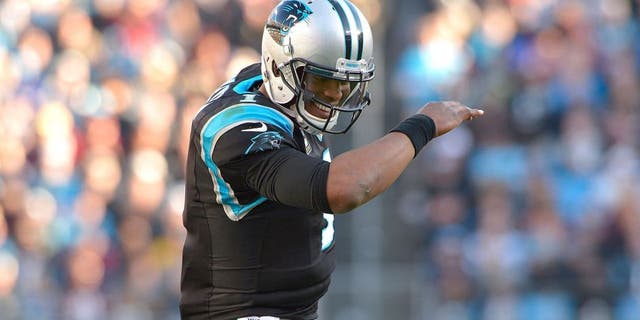 CHARLOTTE, NC - NOVEMBER 22: Cam Newton #1 of the Carolina Panthers does The Dab after a touchdown against the Washington Redskins during their game at Bank of America Stadium on November 22, 2015 in Charlotte, North Carolina. (Photo by Grant Halverson/Getty Images)