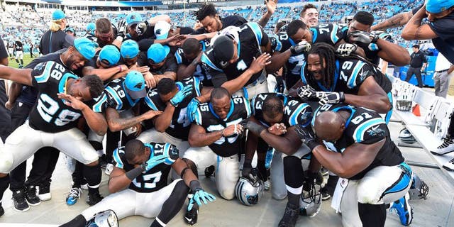 Dec 13, 2015; Charlotte, NC, USA; Carolina Panthers dab late in the game. The Panthers defeated the Falcons 38-0 at Bank of America Stadium. Mandatory Credit: Bob Donnan-USA TODAY Sports