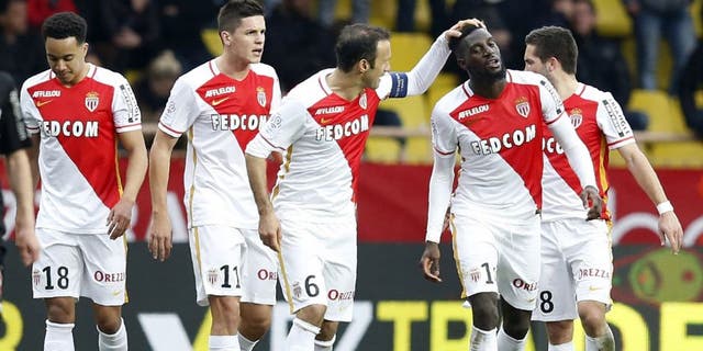 Monaco's French Midfielder Tiemoue Bakayoko (2nd R) celebrates with teammates after scoring a goal during the French L1 football match between Monaco (ASM) and Nice (OGCN) at Louis II Stadium in Monaco on February 6, 2016. AFP PHOTO / VALERY HACHE / AFP / VALERY HACHE (Photo credit should read VALERY HACHE/AFP/Getty Images)