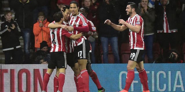 SOUTHAMPTON, ENGLAND - FEBRUARY 06: Maya Yoshida of Southampton (2L) celebrates with team mates as he scores their first goal during the Barclays Premier League match between Southampton and West Ham United at St Mary's Stadium on February 6, 2016 in Southampton, England. (Photo by Alex Broadway/Getty Images)