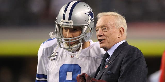 Dec 11, 2011; Dallas, TX, USA; Dallas Cowboys quarterback Tony Romo (9) meets with owner Jerry Jones prior to the game against the New York Giants at Cowboys Stadium. Mandatory Credit: Richard Rowe-USA TODAY Sports