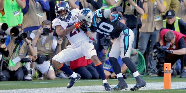 Feb 7, 2016; Santa Clara, CA, USA; Denver Broncos cornerback Aqib Talib (21) is called for a facemark penalty against Carolina Panthers wide receiver Corey Brown (10) during the second quarter in Super Bowl 50 at Levi's Stadium. Mandatory Credit: Kelley L Cox-USA TODAY Sports