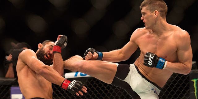 LAS VEGAS, NEVADA - FEBRUARY 06: (R-L) Stephen Thompson kicks Johny Hendricks in their welterweight bout during the UFC Fight Night Las Vegas: Hendricks vs Thompson event inside MGM Grand Garden Arena on February 6, 2016 in Las Vegas Nevada. (Photo by Brandon Magnus/Zuffa LLC/Zuffa LLC via Getty Images)