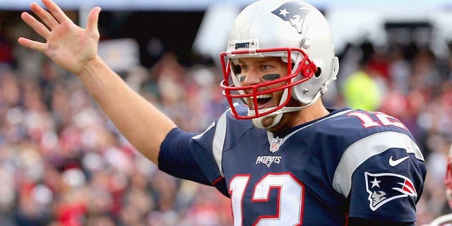 FOXBORO, MA - OCTOBER 25: Tom Brady #12 of the New England Patriots reacts after throwing a touchdown pass during the fourth quarter against the New York Jets at Gillette Stadium on October 25, 2015 in Foxboro, Massachusetts. (Photo by Jim Rogash/Getty Images)