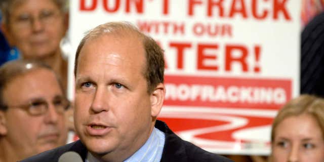 FILE - In this June 7, 2011, file photo, state Sen. Daylin Leach, D-Montgomery, addresses a host of environmental and community groups gathered for a rally in the state capitol against gas drilling in the Marcellus Shale natural gas formation in Harrisburg, Pa.