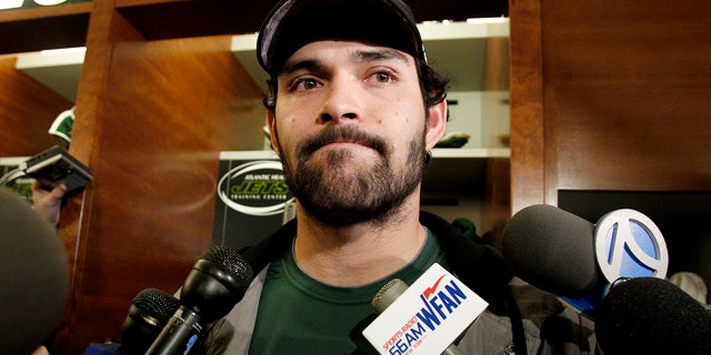 Jan. 24: New York Jets quarterback Mark Sanchez talks to reporters before cleaning out his locker in Florham Park, N.J.
