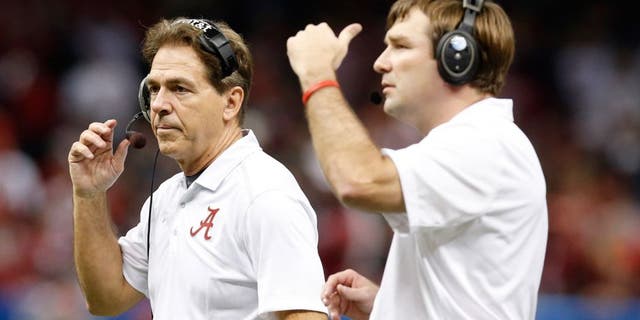 Jan 1, 2015; New Orleans, LA, USA; Alabama Crimson Tide head coach Nick Saban and defensive coordinator Kirby Smart (right) on the sidelines against the Ohio State Buckeyes in the 2015 Sugar Bowl at Mercedes-Benz Superdome. Mandatory Credit: Matthew Emmons-USA TODAY Sports