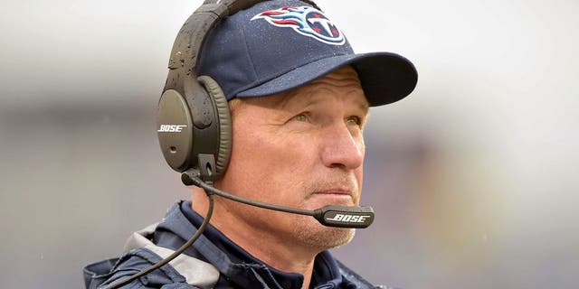 Dec 28, 2014; Nashville, TN, USA; Tennessee Titans head coach Ken Whisenhunt watches his team play against the Indianapolis Colts during the second half at LP Field. The Colts beat the Titans 27-10. Mandatory Credit: Don McPeak-USA TODAY Sports