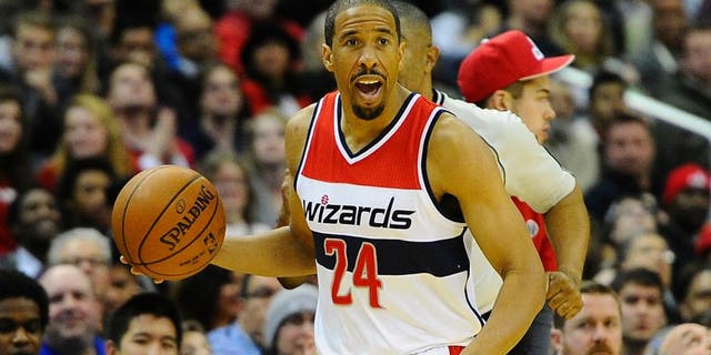 Jan 13, 2015; Washington, DC, USA; Washington Wizards guard Andre Miller (24) advances the ball against the San Antonio Spurs during the second half at Verizon Center. The Wizards won 101-93. Mandatory Credit: Brad Mills-USA TODAY Sports