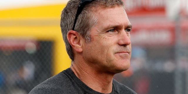 DAYTONA BEACH, FL - JULY 04: Bobby Labonte, driver of the #33 Thunder Coal Chevrolet, stands on the grid during qualifying for the NASCAR Sprint Cup Series Coke Zero 400 at Daytona International Speedway on July 4, 2014 in Daytona Beach, Florida. (Photo by Scott Halleran/Getty Images)