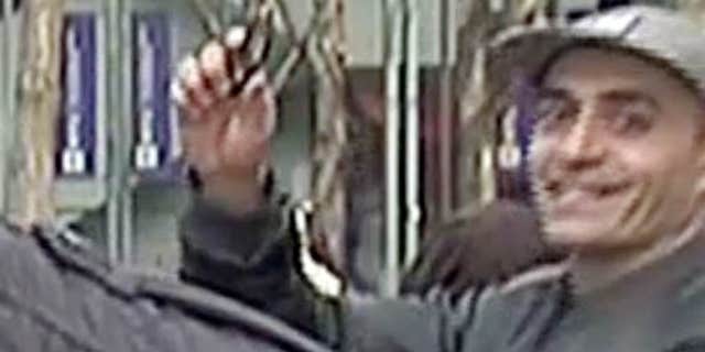 Feb. 10, 2016: In this image taken from WNBC-TV video, a man appears to wave a handgun behind a television news reporter during a live broadcast in New York City