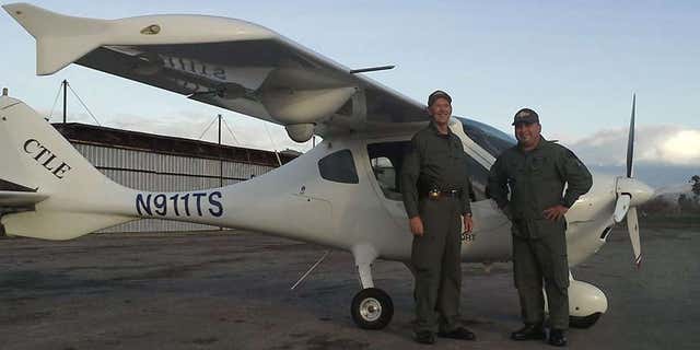 Photo shows Deputy Scott Ballantyne, left, and pilot James Chavez in front of the Tulare County Sheriff's Office plane.
