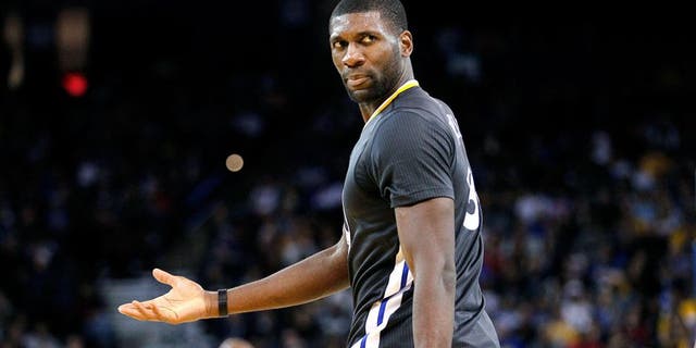 Nov 15, 2014; Oakland, CA, USA; Golden State Warriors center Festus Ezeli (31) looks towards a referee after a play against the Charlotte Hornets in the fourth quarter at Oracle Arena. The Warriors defeated the Hornets 112-87. Mandatory Credit: Cary Edmondson-USA TODAY Sports
