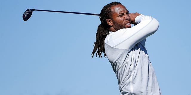 SCOTTSDALE, AZ - FEBRUARY 03: Arizona Cardinals wide receiver Larry Fitzgerald hits a tee shot on the 15th hole during the pro-am for the the Waste Management Phoenix Open at TPC Scottsdale on February 3, 2016 in Scottsdale, Arizona. (Photo by Christian Petersen/Getty Images)