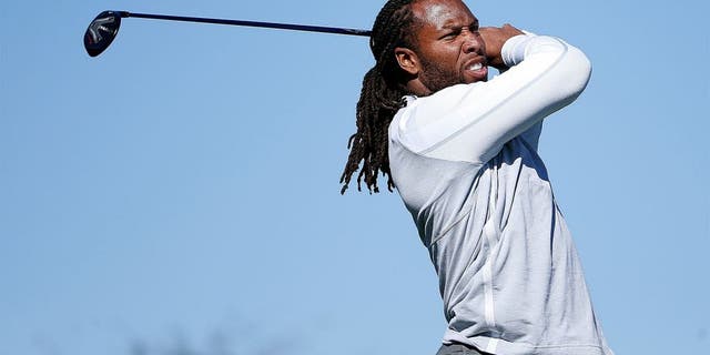 SCOTTSDALE, AZ - FEBRUARY 03: Arizona Cardinals wide receiver Larry Fitzgerald hits a tee shot on the 15th hole during the pro-am for the the Waste Management Phoenix Open at TPC Scottsdale on February 3, 2016 in Scottsdale, Arizona. (Photo by Christian Petersen/Getty Images)