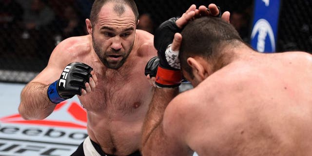LAS VEGAS, NV - DECEMBER 11: (L-R) Konstantin Erokhin punches Gabriel Gonzaga in their heavyweight bout during the TUF Finale event inside The Chelsea at The Cosmopolitan of Las Vegas on December 11, 2015 in Las Vegas, Nevada. (Photo by Jeff Bottari/Zuffa LLC/Zuffa LLC via Getty Images)