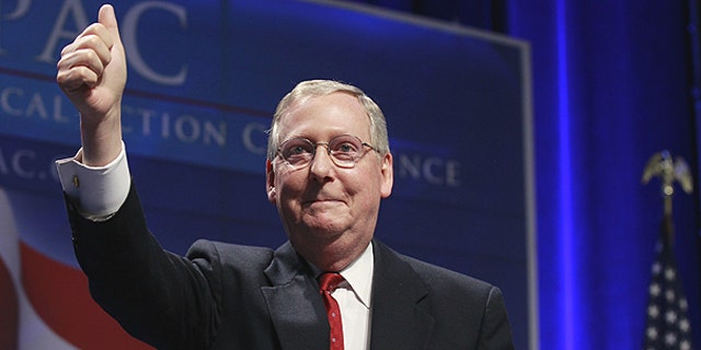 Feb. 10: Senate Minority Leader Mitch McConnell of Ky., gives thumbs up after addrssing the Conservative Political Action Conference (CPAC) in Washington.