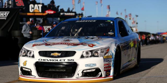 DAYTONA BEACH, FL - FEBRUARY 12: Kevin Harvick, driver of the #4 Busch Beer Chevrolet, drives through the garage area during practice for the NASCAR Sprint Cup Series Sprint Unlimited at Daytona International Speedway on February 12, 2016 in Daytona Beach, Florida. (Photo by Chris Graythen/Getty Images)