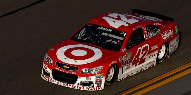 DAYTONA BEACH, FL - FEBRUARY 12: Kyle Larson, driver of the #42 Target Chevrolet, stands in the garage area during practice for the NASCAR Sprint Cup Series Sprint Unlimited at Daytona International Speedway on February 12, 2016 in Daytona Beach, Florida. (Photo by Jonathan Ferrey/NASCAR via Getty Images)