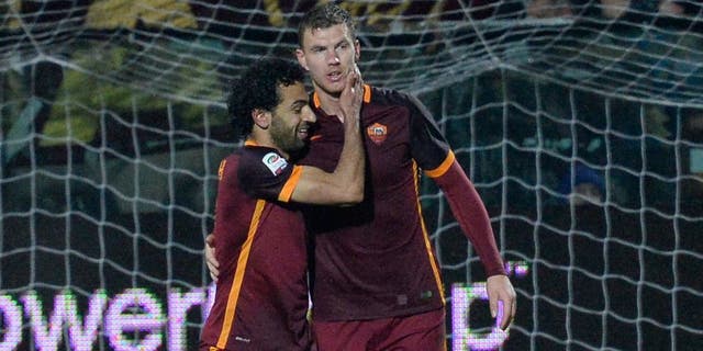 MODENA, ITALY - FEBRUARY 12: Edin Dzeko of AS Roma celebrate after scoring his team's second goal during the Serie A match between Carpi FC and AS Roma at Alberto Braglia Stadium on February 12, 2016 in Modena, Italy. (Photo by Dino Panato/Getty Images)