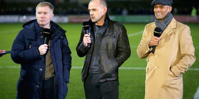 SALFORD, ENGLAND - DECEMBER 04: The BBC pundits (L-R) Paul Scholes, part owner of Salford City and former players Danny Murphy and Trevor Sinclair talk prior to the Emirates FA Cup Second Round match between Salford City and Hartlepool United at Moor Lane on December 4, 2015 in Salford, England. (Photo by Alex Livesey/Getty Images)