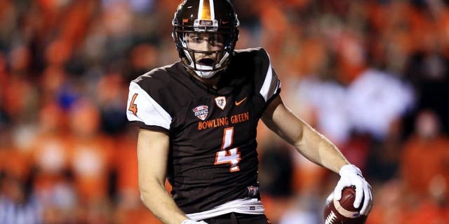 TOLEDO, OH - NOVEMBER 17: Wide receiver Gehrig Dieter #4 of the Bowling Green Falcons celebrates after catching a pass for a touchdown during the fourth quarter against the Toledo Rockets at Doyt Perry Stadium on November 17, 2015 in Bowling Green, Ohio. Toledo defeated Bowling Green 44-28. (Photo by Andrew Weber/Getty Images)