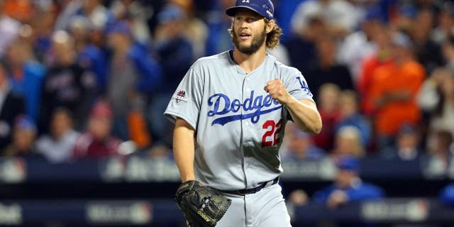 Oct 13, 2015; New York City, NY, USA; Los Angeles Dodgers starting pitcher Clayton Kershaw (22) reacts after the seventh inning against the New York Mets in game four of the NLDS at Citi Field. Mandatory Credit: Brad Penner-USA TODAY Sports