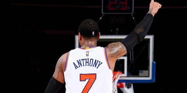 NEW YORK, NY - FEBRUARY 9: Carmelo Anthony #7 of the New York Knicks reacts to a play against the Washington Wizards on February 9, 2016 at Madison Square Garden in New York City, New York. NOTE TO USER: User expressly acknowledges and agrees that, by downloading and or using this photograph, User is consenting to the terms and conditions of the Getty Images License Agreement. Mandatory Copyright Notice: Copyright 2016 NBAE (Photo by Nathaniel S. Butler/NBAE via Getty Images)