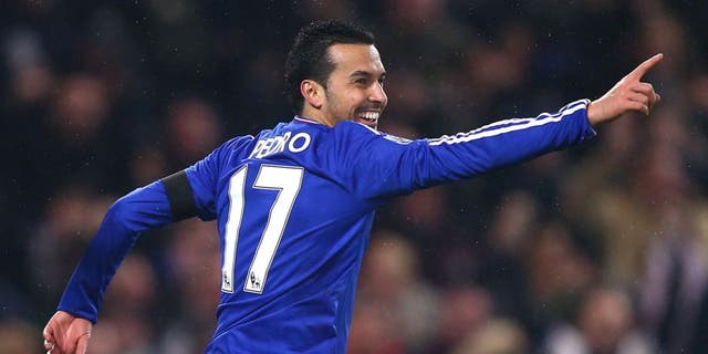 LONDON, ENGLAND - FEBRUARY 13: Pedro of Chelsea celebrates scoring his team's fourth goal during the Barclays Premier League match between Chelsea and Newcastle United at Stamford Bridge on February 13, 2016 in London, England. (Photo by Clive Rose/Getty Images)