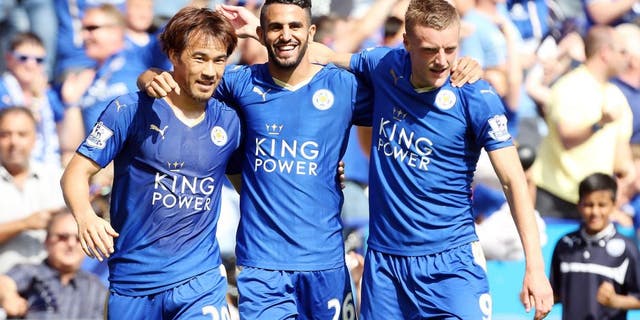 LEICESTER, ENGLAND - AUGUST 08: GOAL Riyad Mahrez of Leicester City celebrates with Jamie Vardy and Shinji Okazaki of Leicester City after scoring to make it 2-0 during the Barclays Premier League match between Leicester City and Sunderland at the King Power Stadium on August 08, 2015 in Leicester, England. (Photo by Plumb Images/Leicester City FC via Getty Images)