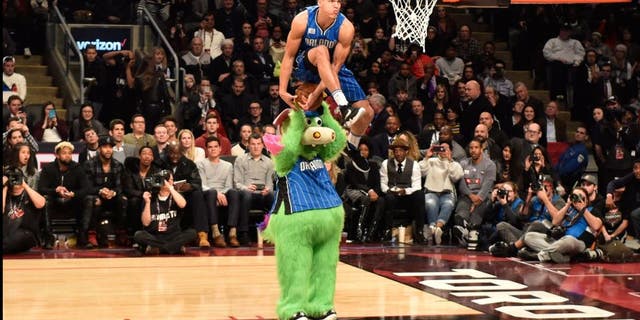 Orlando Magic forward Aaron Gordon competes during the NBA all-star slam dunk skills competition in Toronto on Saturday, Feb. 13, 2016. (Mark Blinch/The Canadian Press via AP) MANDATORY CREDIT