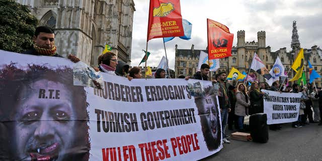Feb. 4, 2016: Kurds demonstrate outside the conference center in London.