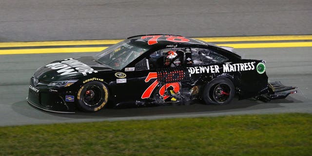 DAYTONA BEACH, FL - FEBRUARY 13: Martin Truex Jr., driver of the #78 Furniture Row/Denver Mattress Toyota, drives his car after being involved in an on-track incident during the NASCAR Sprint Cup Series Sprint Unlimited at Daytona International Speedway on February 13, 2016 in Daytona Beach, Florida. (Photo by Brian Lawdermilk/Getty Images)