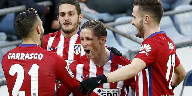 Football Soccer - Getafe v Atletico Madrid - Spanish Liga BBVA - Coliseum Alfonso Perez stadium, Madrid, Spain - 14/02/16 Atletico Madrid players celebrate Fernando Torres' goal. REUTERS/Andrea Comas Picture Supplied by Action Images
