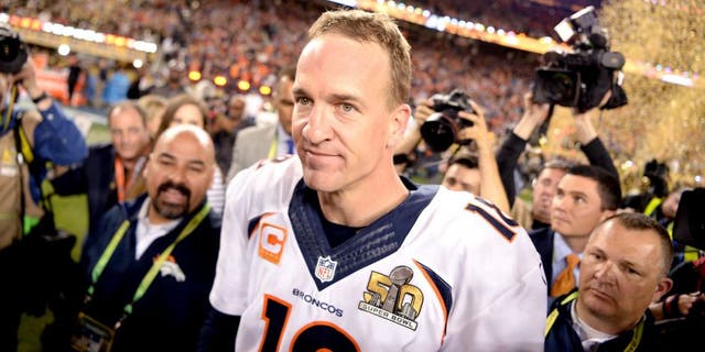 SANTA CLARA, CA - FEBRUARY 07: Peyton Manning (18) of the Denver Broncos walks through the crowd as the confetti flies after the Broncos win. The Denver Broncos played the Carolina Panthers in Super Bowl 50 at Levi's Stadium in Santa Clara, Calif. on February 7, 2016. (Photo by AAron Ontiveroz/The Denver Post via Getty Images)
