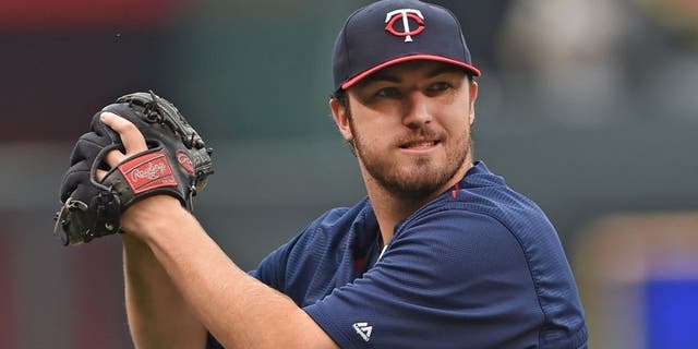 Jul 2, 2015; Kansas City, MO, USA; Minnesota Twins pitcher Phil Hughes (45) looks on during batting practice prior to the game against the Kansas City Royals at Kauffman Stadium. Mandatory Credit: Peter G. Aiken-USA TODAY Sports